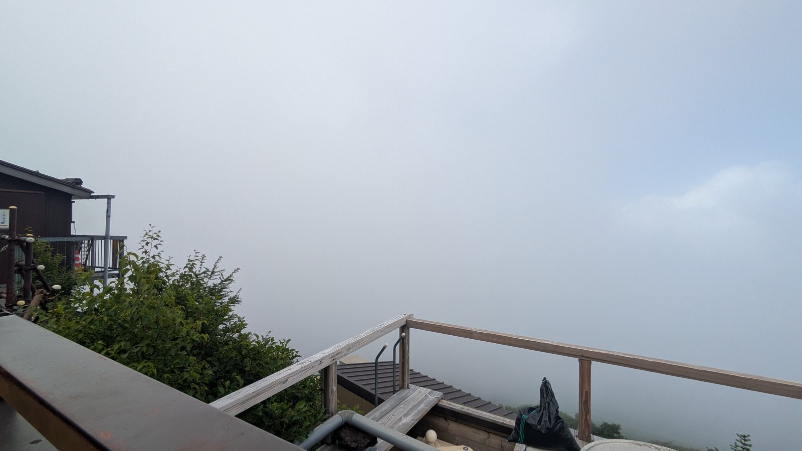 The deck outside the hut with cloud filling the view