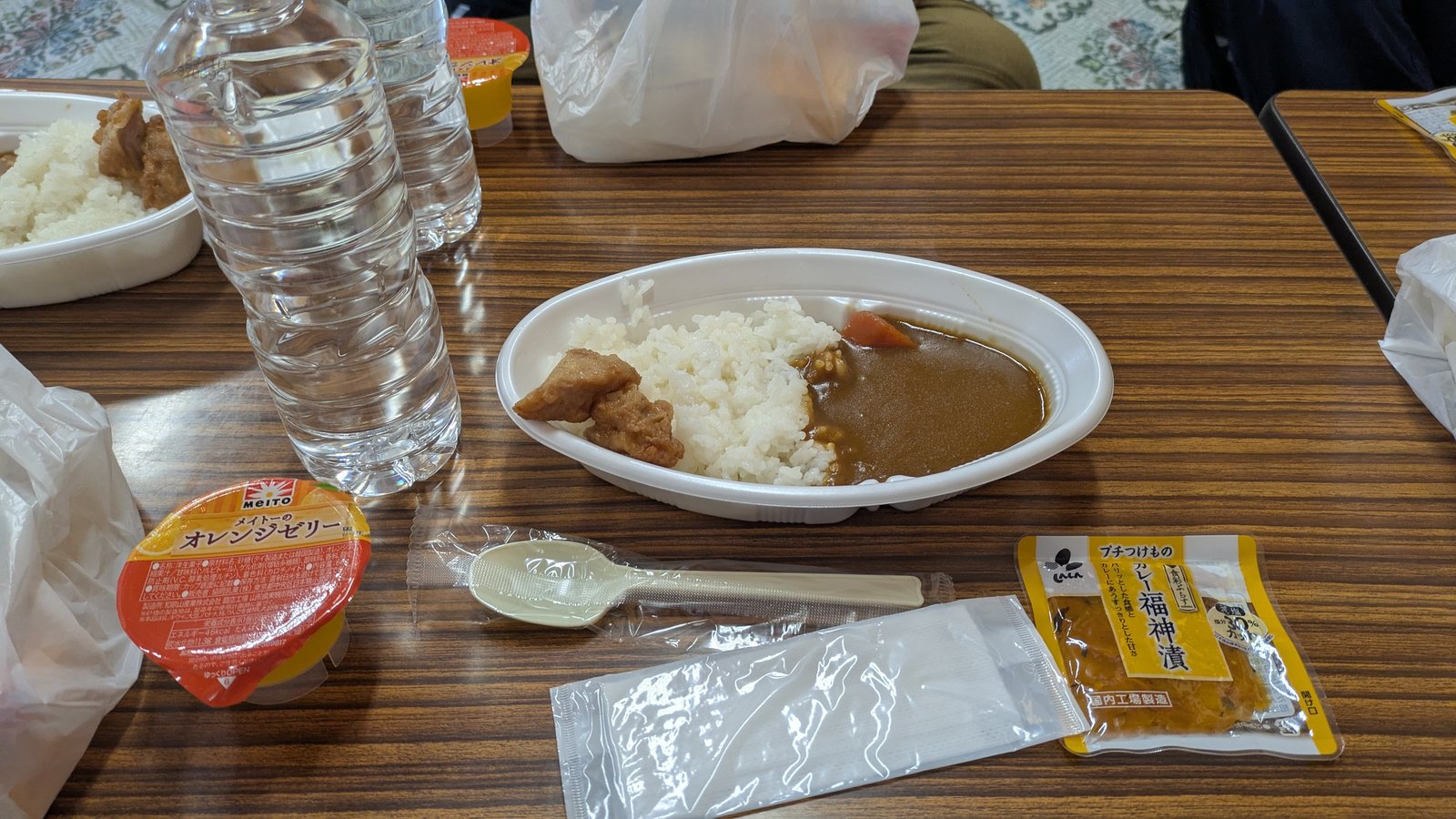 Curry rice served on a foam plate at a mountain hut