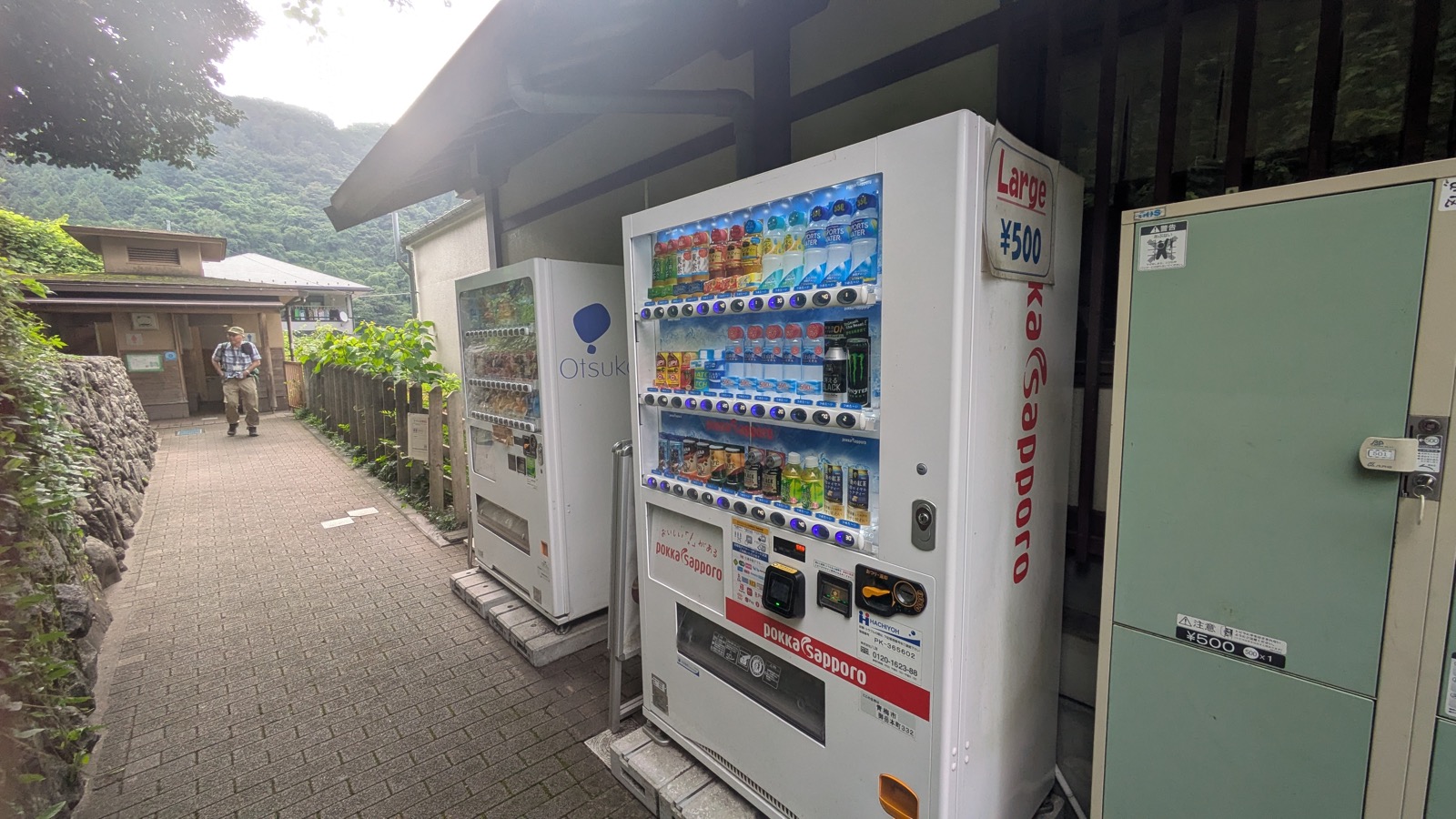 Vending machines beside a toilet block at a small country railway station