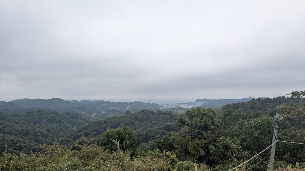 The view from the Tenen ridge over wooded hills towards Sagami Bay